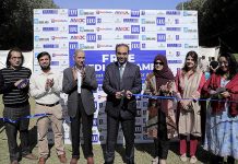 Director Academics Doctor Syed Ali Raza cutting the ribbon to inaugurates free Medical Camp with faculty members at Iqra University North Campus