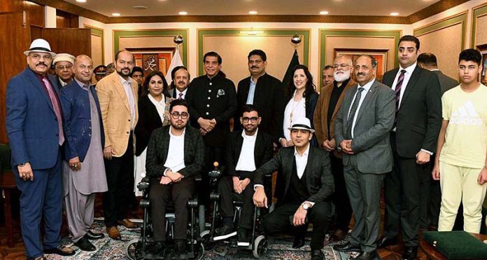 Speaker National Assembly Raja Pervez Ashraf in a group photo with UK/USA Humanitarian Delegation for Pakistan Led by Lord Qurban Hussain Member of House of Lords at Parliament House