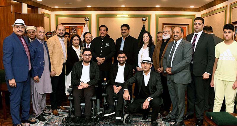 Speaker National Assembly Raja Pervez Ashraf in a group photo with UK/USA Humanitarian Delegation for Pakistan Led by Lord Qurban Hussain Member of House of Lords at Parliament House