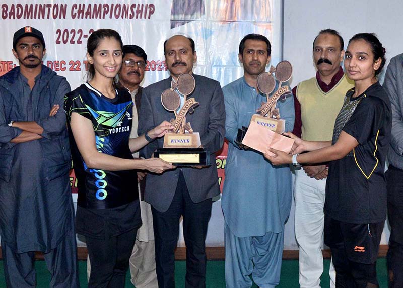 Deputy Secretary of Excise Department Irshad Kamlani giving away trophies to winners after final of All Pakistan Ranking Badminton Championship 2022-23 at Hyderabad club organized by Sindh Sports Board