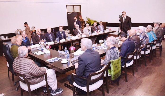 President Dr Arif Alvi chairing a meeting of the Lahore University of Management Sciences (LUMS) Advisory Board, during his visit to LUMS
