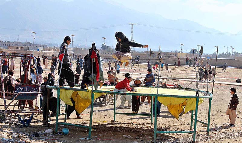 Children jumping on trampoline at Takhtani Eastern Bypass.