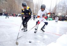 Sportsmen in action during the Shayok Winter Festival 2023 Ice Hockey to promote the winter tourism in Pakistan specially in Gilgit Baltistan