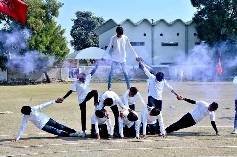 Students running with rings in race during different games a Sports gala at a local collage