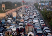 A view of massive traffic jam at Shahrah-e-Faisal in the Provincial Capital.