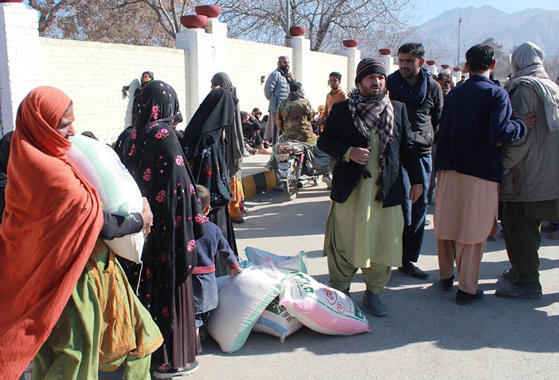 People purchasing flour bags on subsidized rates at Railway Station