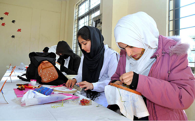 Students are busy in embroidery competition held in connection with Intercollegiate events Islamabad Model college for girls Bhara Kaho