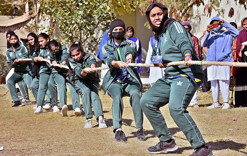 Students of different colleges participating in tug-of-war competition during 5th Sindh College Games 2023 at Begum Nusrat Bhutto Govt. Girls Degree College.