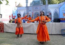 Folk artists performing traditional dance during Sindh Sufi Melo at Sindh Museum