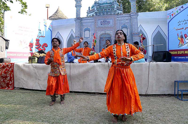 Folk artists performing traditional dance during Sindh Sufi Melo at Sindh Museum