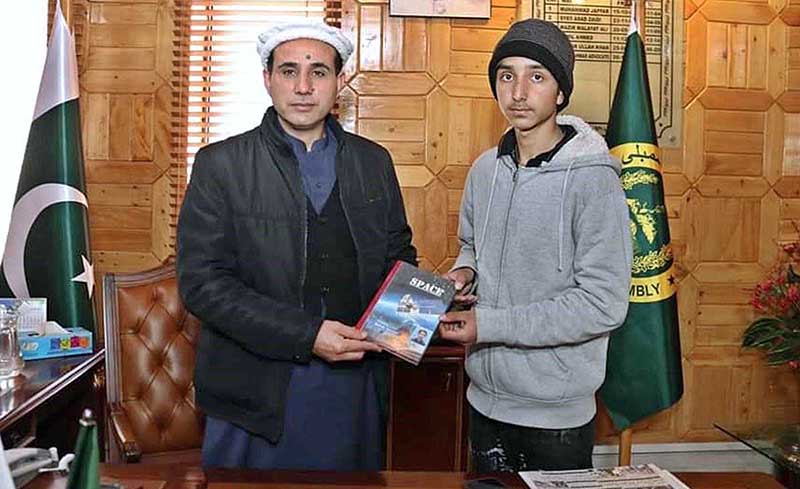 Author Sohail Tanveer presenting his book “Space" to Deputy Speaker Gilgit-Baltistan Assembly Nazir Ahmad Advocate at assembly secretariat