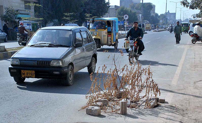 A view of open manhole on the main road which may cause an accident and needs the attention of the concerned authorities