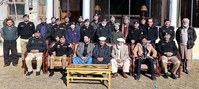 Inspector General of Police Gilgit-Baltistan Muhammad Saeed Wazir and DIG Head Quarter Naveed Ahmad Nisar Khwaja in a group photo with retired officers