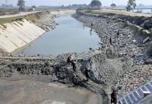 A view of desiccation a canal before cleaning from irrigation department at Phulei Canal