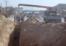 SNGPL staffers busy in laying Sui gas pipeline at southern bypass