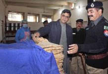DIG Punjab Jails Rana Naveed Rauf is inspecting the food of prisoners during his visit to the District Jail