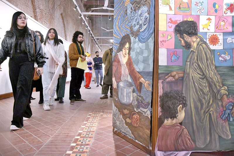Students and visitors viewing the displayed paintings and different Arts work during the Master of Visual Art Artists exhibition (Degree Show 2022) by National College of Arts