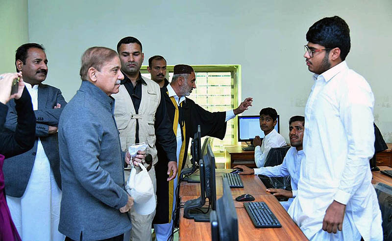 Prime Minister Muhammad Shehbaz Sharif visiting the newly-developed Computer Lab at Govt Boys Secondary School, Ghulam Rasool, Jia Khan.