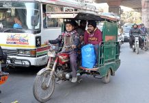 An underage driver driving a motorcycle rickshaw for a living which can lead to a major accident at any time on Lower Mall Road