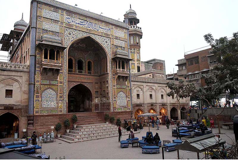 A beautiful view of outside the entrance gate of Masjid Wazir Khan at walled city. The Wazir Khan Mosque is 17th century. The mosque was commissioned during the reign of the Mughal Emperor Shah Jahan as part of an ensemble of buildings that also included the nearby Shahi Hammam baths. Construction of Wazir Khan Mosque began in 1634 C.E., and was completed in 1641