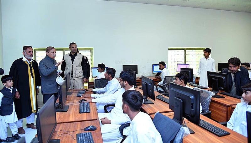 Prime Minister Muhammad Shehbaz Sharif visiting the newly-developed Computer Lab at Govt Boys Secondary School, Ghulam Rasool, Jia Khan.
