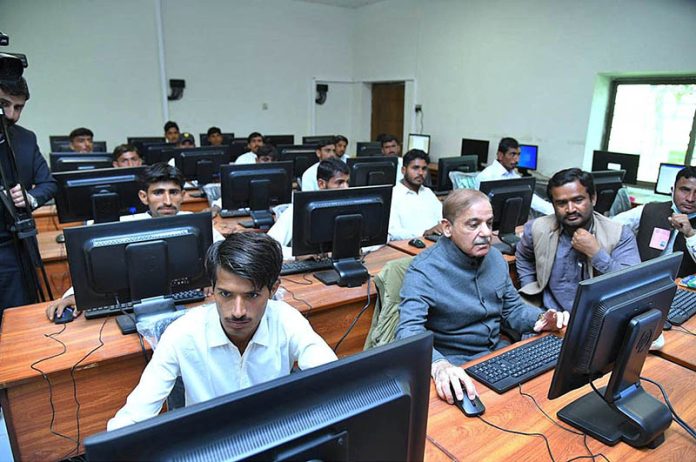 Prime Minister Muhammad Shehbaz Sharif visiting the newly-developed Computer Lab at Govt Boys Secondary School, Ghulam Rasool Jia Khan.