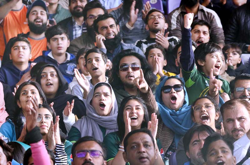 Cricket fans enjoying during the third and final one-day international (ODI) cricket match between Pakistan and New Zealand at the National Stadium