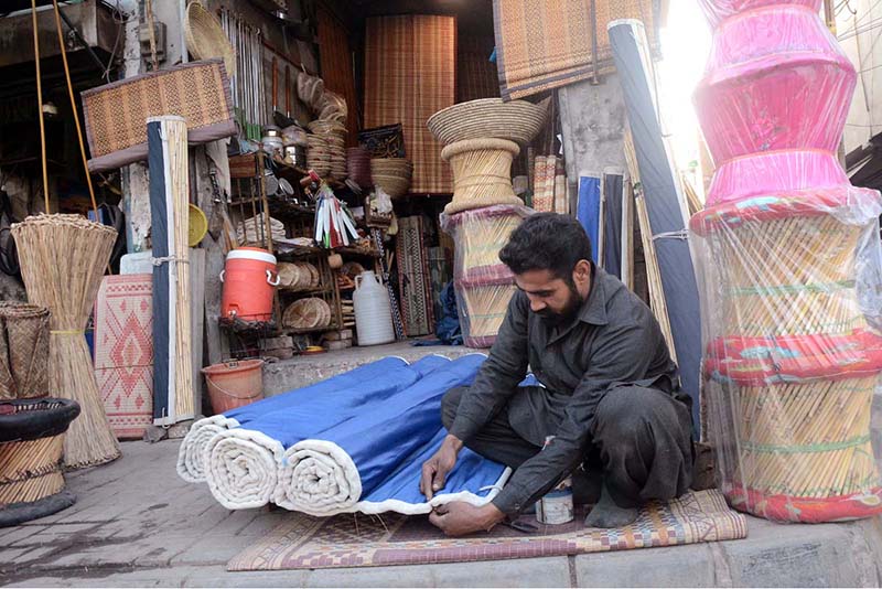 Worker making traditional curtain (Chik) at their workplace