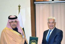 Defence Minister Khawaja Muhammad Asif presenting a shield to H.E Engr Talat Abdullah Alotaibi Assistant Defence Minister of Saudi Arabia in Ministry of Defence.