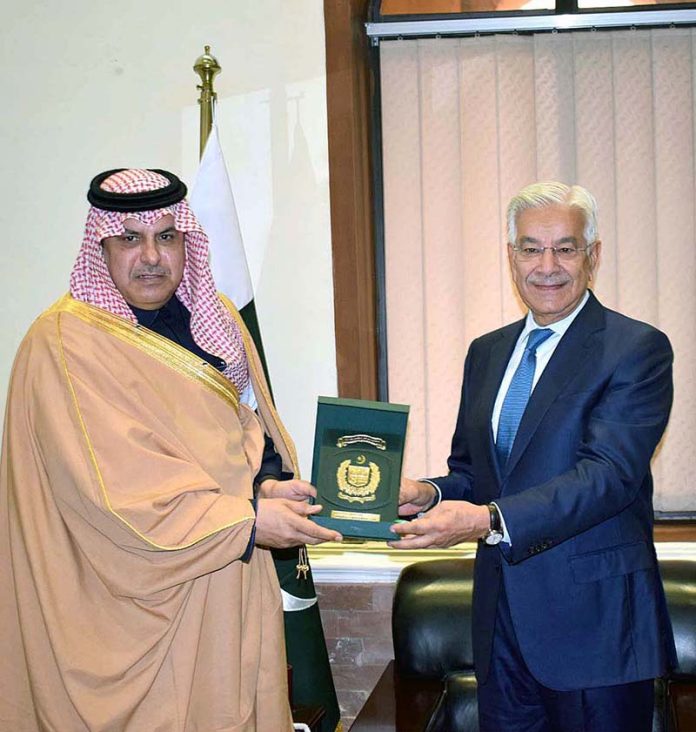 Defence Minister Khawaja Muhammad Asif presenting a shield to H.E Engr Talat Abdullah Alotaibi Assistant Defence Minister of Saudi Arabia in Ministry of Defence.