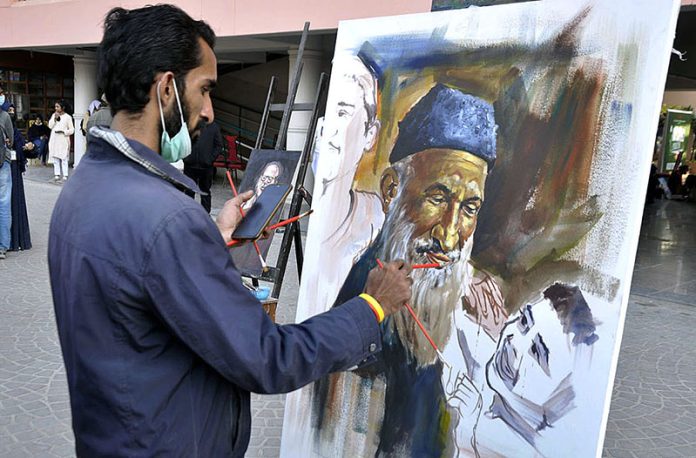 Student of Arts Giving final touch to his artwork during the Pakistan Youth Festival 2023 as a large number of male and female students from different colleges and universities participated at the Arts Council of Pakistan