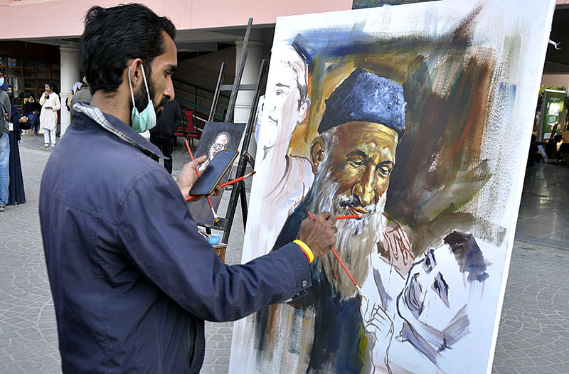 Student of Arts Giving final touch to his artwork during the Pakistan Youth Festival 2023 as a large number of male and female students from different colleges and universities participated at the Arts Council of Pakistan