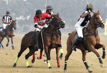 Players in action between Sq Seagold vs 4 corps at Jinnah Polo fields duringLahore Smart City Allma Iqbal Polo Cup 2023 at JPF DHA