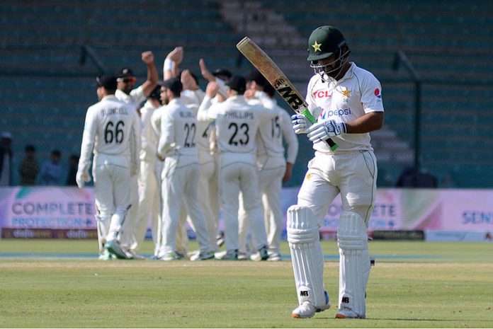 New Zealand celebrates after taking a wicket of a Pakistani player Abdullah Shafique during the second day of the second cricket test match between Pakistan and New Zealand at the National Stadium