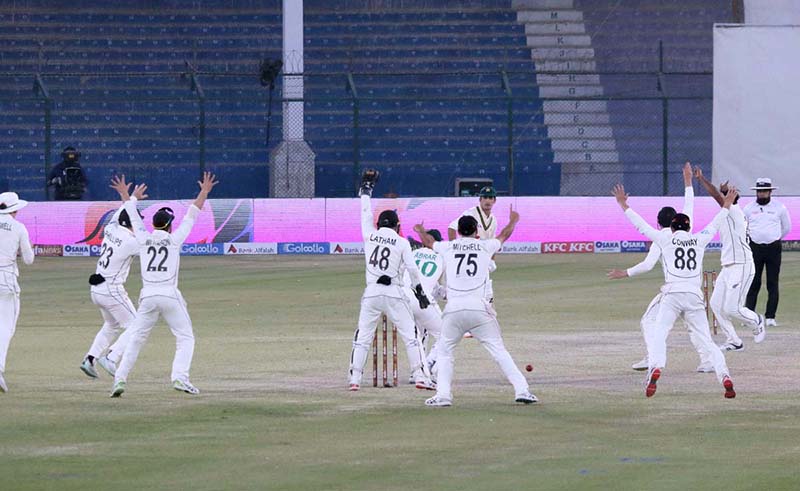 Pakistan players Naseem Shah and Abrar Ahmed along with New Zealand team back after Drawn Match and Test Series during the fifth and final day of the second cricket Test match between Pakistan and New Zealand at the National Stadium