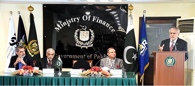 Finance Minister Senator Mohammad Ishaq Dar addressing agreement signing ceremony of launching Pilot project of Digitization / Dematerialization on NSCs through CDC, at Finance Division
