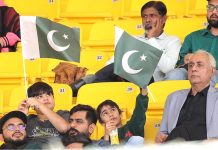 Cricket fans enjoying during the first One Day International (ODI) cricket match between Pakistan and New Zealand at the National Stadium