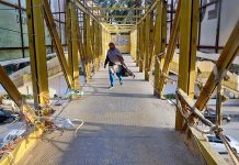 A view of bridge on the busy road with wide gaps between the iron girds of protective walls can lead to a fatal accident in the Provincial Capital City