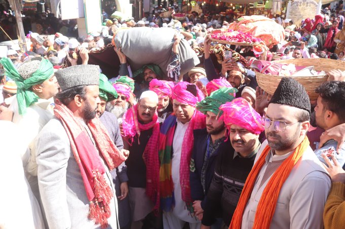 Pakistani Zaireen lay traditional Chaddar at Dargah Ajmer Sharif