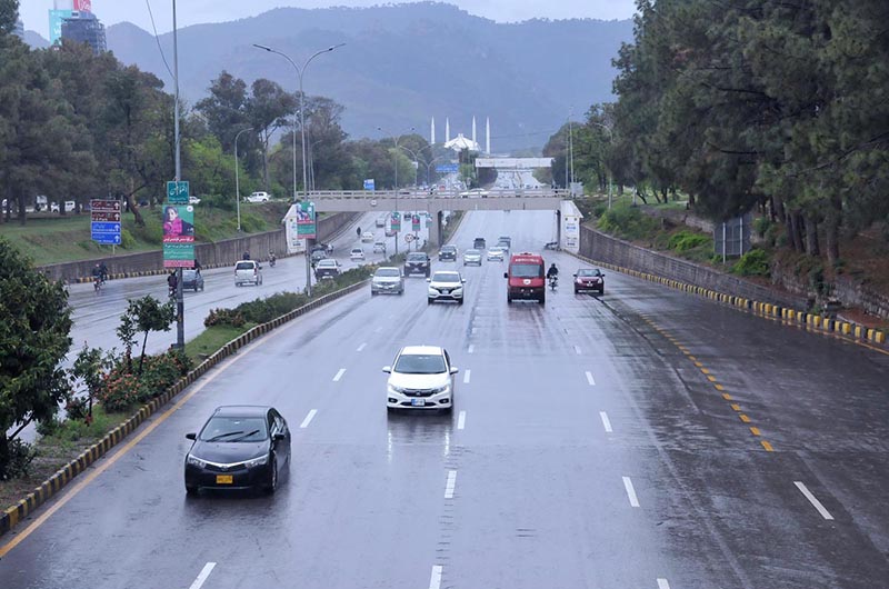 <em>Traffic on the way during rain at Faisal Avenue in the Federal Capital</em>