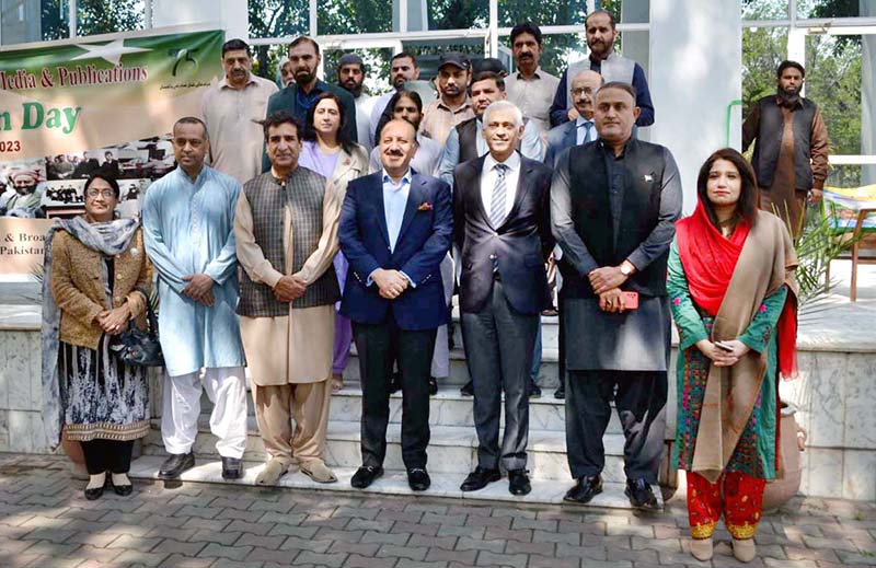Parliamentary Secretary Information & Broadcasting Choudhry Muhammad Shahbaz Babar in a group photo with participants during Digital Photographic Exhibition to celebrate Pakistan Day at Information Service Academy