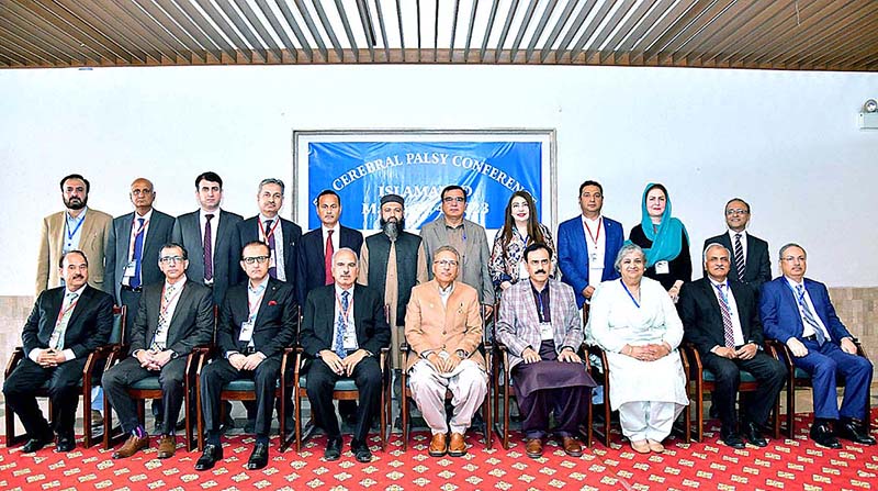 President Dr. Arif Alvi in a group photo with the participants of the 5th Cerebral Palsy Conference