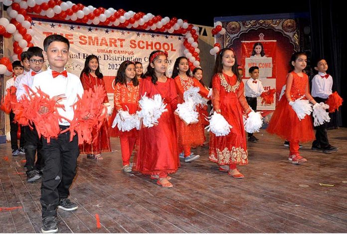 Students performing tableau during annual prize distribution ceremony of The Smart School Umar Campus Misrial Road