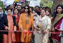 Nabeela Hakim, Ombudswomen Punjab, along with Vice Chancellor GCWUF Prof Dr Robina Farooq is cutting ribbon to inaugurate nutrition festival organized by Department of Nutritional Sciences GC Women University Faisalabad (GCWUF)