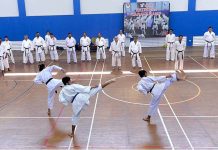 Karate players performing during 7th JKA National Karate Camp at Pakistan Sports Complex