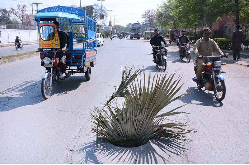 A view of an open main-hole in the middle of State Bank Road near GTS Chowk may cause any mishap and needs the attention of concerned authorities
