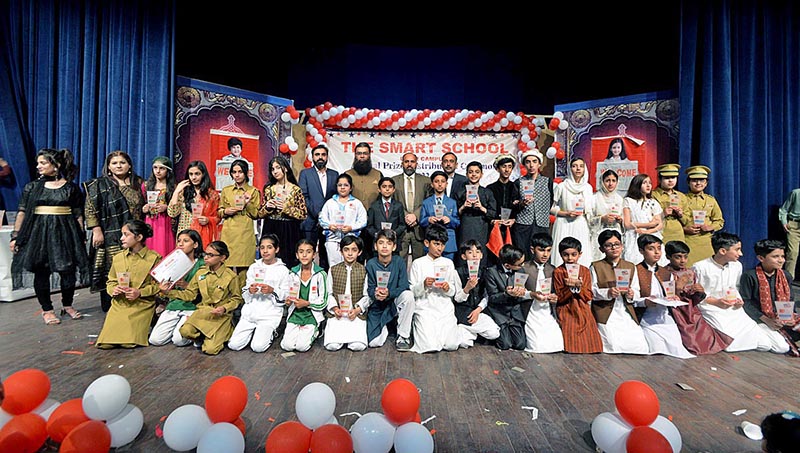 Salman Bashir AGM The Smart School & Colleges and Sheikh Umar Director Smart School Umar Campus in a group photo with position holders during annual prize distribution ceremony of The Smart School Umar Campus Misrial Road