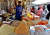 Women purchasing spices for upcoming Holy Month Ramadan at Margalla Ramzan Bazar.