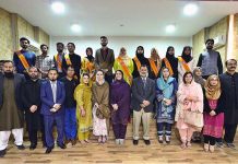 Chairperson Peace & Culture Organization Mushaal Hussein Mullick the wife of Jailed Kashmiri Hurriyat Leader Mohammad Yasin Malik in a group photo with participants of the seminar on "Status of Women's Rights in Indian IIOJK at NUML