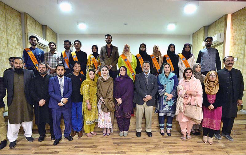 Chairperson Peace & Culture Organization Mushaal Hussein Mullick the wife of Jailed Kashmiri Hurriyat Leader Mohammad Yasin Malik in a group photo with participants of the seminar on "Status of Women's Rights in Indian IIOJK at NUML